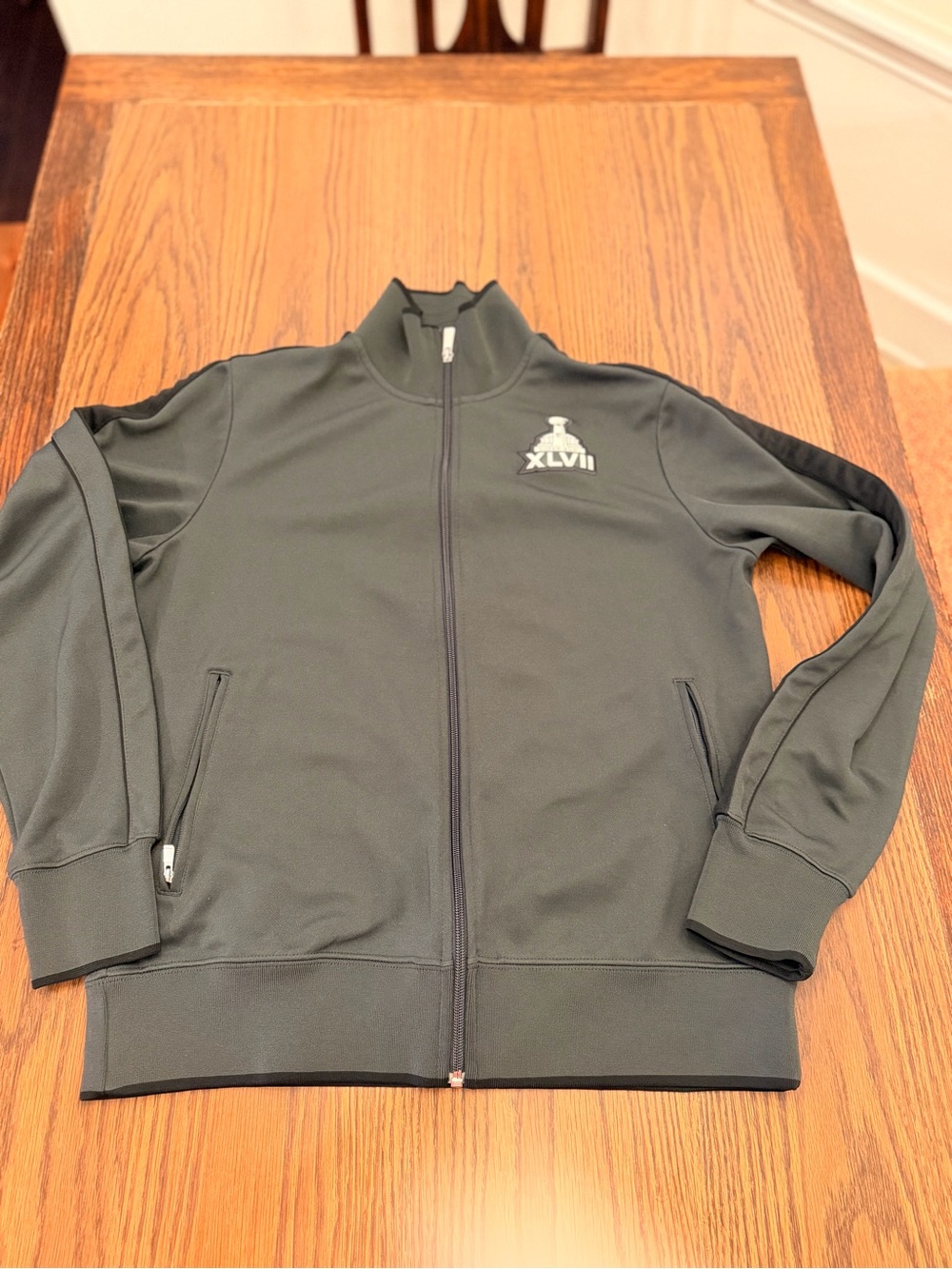 Men's black Full-Zip Track Jacket with Super Bowl XLVII Logo